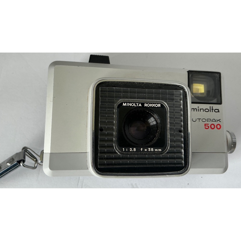 Minolta Vintage Autopak 500 Film Camera Rokkor 38mm f/2.8 Lens Silver Black Retr